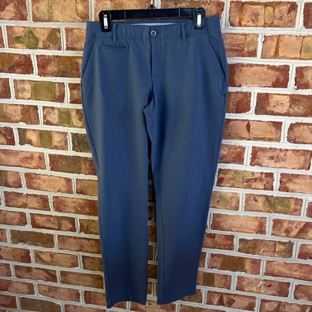 Under Armour blue stretch performance golf pants with pockets. Size 8.